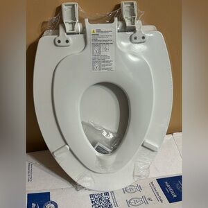 Mayfair NextStep2 Toilet Seat White with Built-In Potty Training Seat Elongated